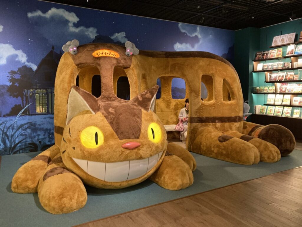 Seated cat bus and Ghibli books